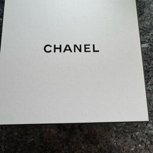 Chanel gift box 8.75”x8.75”x4” one free red Chanel ribbon with purchase of box.
